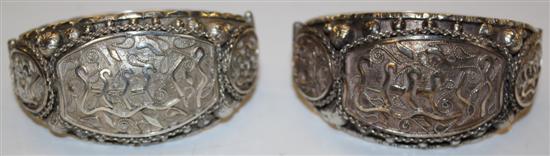 Pair of silver hinged bracelets(-)